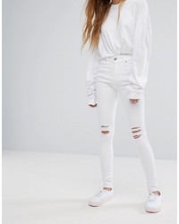 weiße enge Jeans mit Destroyed-Effekten von Dr. Denim