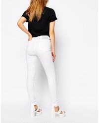 weiße enge Jeans mit Destroyed-Effekten von WÅVEN