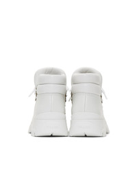 weiße flache Stiefel mit einer Schnürung aus Leder von Prada
