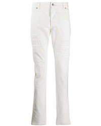 weiße Jeans mit Destroyed-Effekten von Balmain