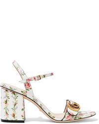 weiße Schuhe aus Leder mit Blumenmuster