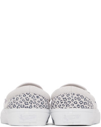 weiße Slip-On Sneakers aus Segeltuch mit Leopardenmuster von Vans