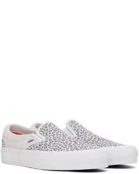 weiße Slip-On Sneakers aus Segeltuch mit Leopardenmuster von Vans