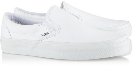 white canvas slip on vans