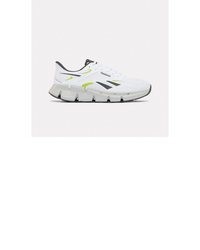 weiße Sportschuhe von Reebok