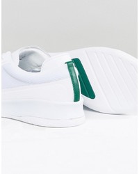 weiße Turnschuhe von Lacoste