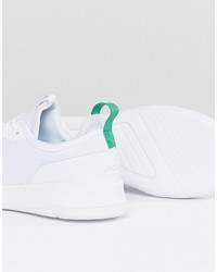 weiße Turnschuhe von Lacoste