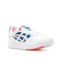 weiße und blaue niedrige Sneakers von Asics