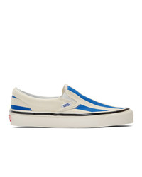 weiße und blaue Slip-On Sneakers aus Segeltuch