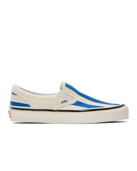 weiße und blaue Slip-On Sneakers