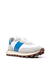 weiße und blaue Sportschuhe von Tod's