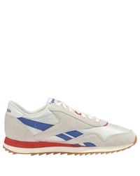 weiße und blaue Sportschuhe von Reebok