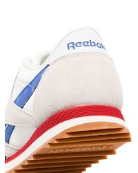 weiße und blaue Sportschuhe von Reebok