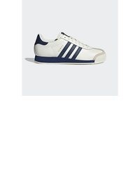 weiße und dunkelblaue Leder niedrige Sneakers von adidas Originals