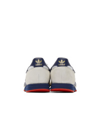 weiße und dunkelblaue Segeltuch niedrige Sneakers von adidas Originals