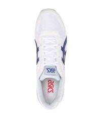 weiße und dunkelblaue Sportschuhe von Asics