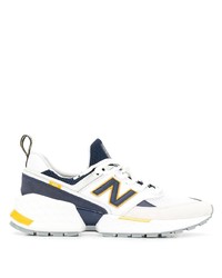 weiße und dunkelblaue Sportschuhe von New Balance