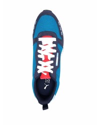 weiße und dunkelblaue Sportschuhe von Puma