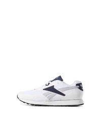 weiße und dunkelblaue Sportschuhe von Reebok Classic