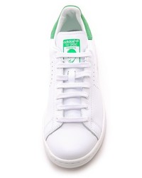 weiße und grüne niedrige Sneakers von Raf Simons