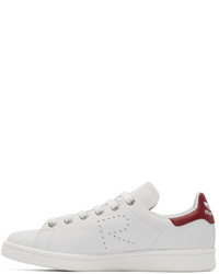 weiße und rote niedrige Sneakers von Adidas By Raf Simons