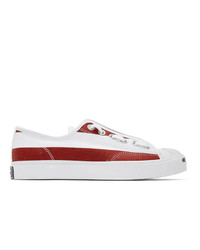 weiße und rote Segeltuch niedrige Sneakers