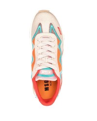 weiße und rote Sportschuhe von MSGM