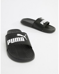 weiße und schwarze flache Sandalen aus Leder von Puma