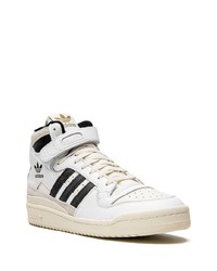 weiße und schwarze hohe Sneakers aus Leder von adidas