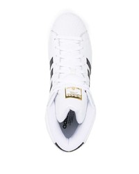 weiße und schwarze hohe Sneakers aus Leder von adidas