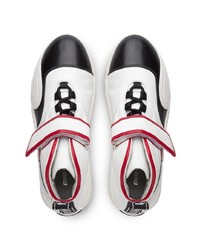 weiße und schwarze hohe Sneakers aus Leder von Miu Miu