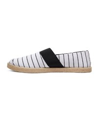 weiße und schwarze horizontal gestreifte Slip-On Sneakers aus Segeltuch von Quiksilver