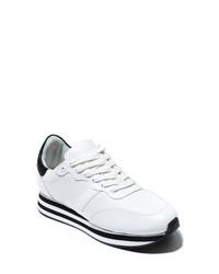 weiße und schwarze klobige niedrige Sneakers