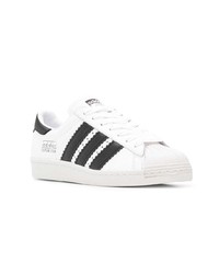 weiße und schwarze Leder niedrige Sneakers von adidas