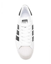 weiße und schwarze Leder niedrige Sneakers von adidas