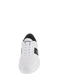 weiße und schwarze Leder niedrige Sneakers von Lacoste