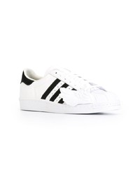 weiße und schwarze Leder niedrige Sneakers von adidas