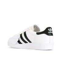 weiße und schwarze Leder niedrige Sneakers von adidas