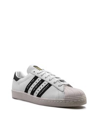 weiße und schwarze Leder niedrige Sneakers von adidas