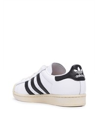 weiße und schwarze Leder niedrige Sneakers von adidas