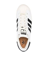 weiße und schwarze Leder niedrige Sneakers von adidas