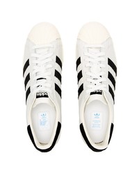 weiße und schwarze Leder niedrige Sneakers von adidas