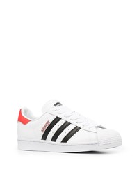 weiße und schwarze Leder niedrige Sneakers von adidas