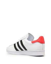 weiße und schwarze Leder niedrige Sneakers von adidas