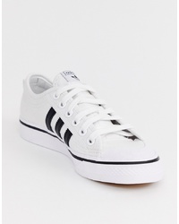 weiße und schwarze niedrige Sneakers von adidas Originals