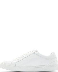 weiße und schwarze niedrige Sneakers von Comme des Garcons