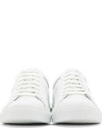 weiße und schwarze niedrige Sneakers von Comme des Garcons
