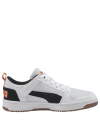 weiße und schwarze niedrige Sneakers von Puma