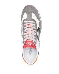 weiße und schwarze Sportschuhe von Premiata