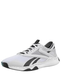 weiße und schwarze Sportschuhe von Reebok